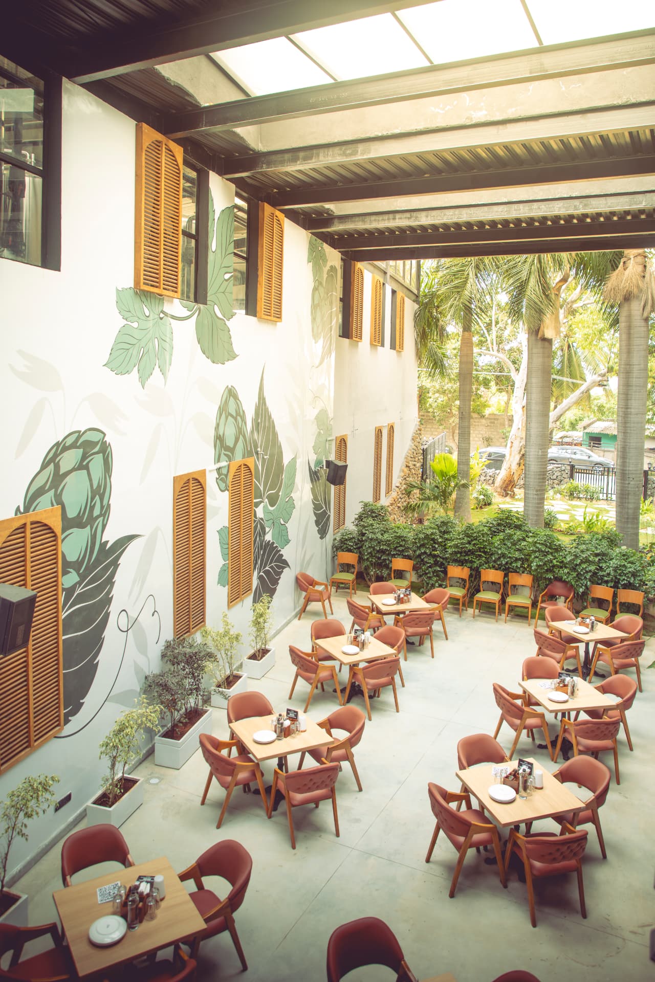 Courtyard beneath the hop-leaf mural