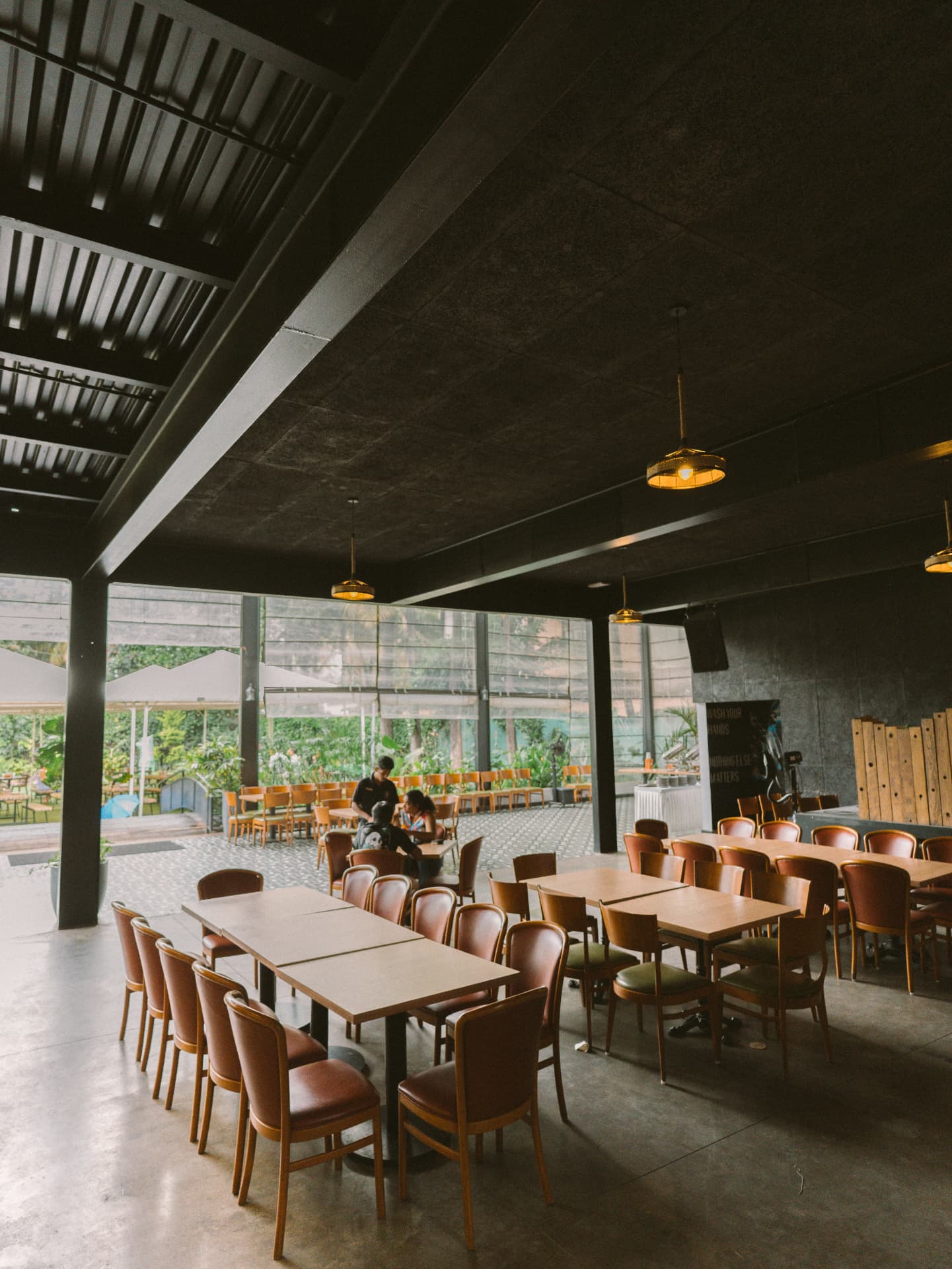 The dining hall with long shared tables