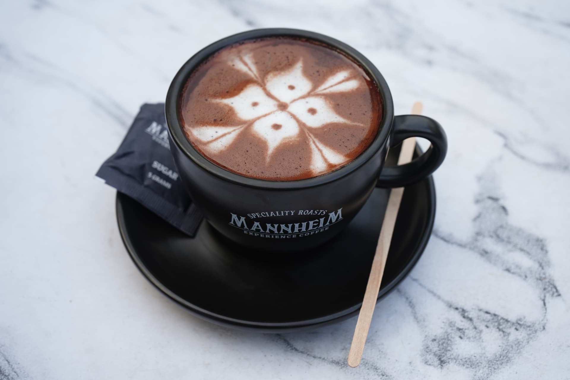 Mannheim hot chocolate with flower latte art